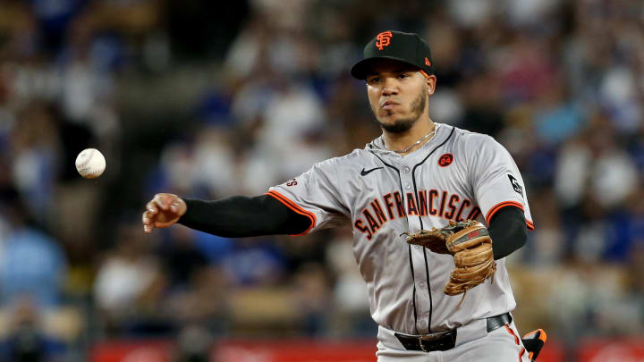 Jul 23, 2024; Los Angeles, California, USA; San Francisco Giants second baseman Thairo Estrada (39) throws to first for an out during the fifth inning against the Los Angeles Dodgers at Dodger Stadium. 