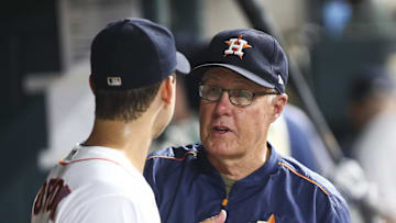Jul 31, 2017; Houston, TX, USA; Houston Astros pitching coach Brent Strom (56) talks with starting pitcher Charlie Morton (50) in the dugout during the game against the Tampa Bay Rays at Minute Maid Park. Mandatory Credit: Troy Taormina-Imagn Images