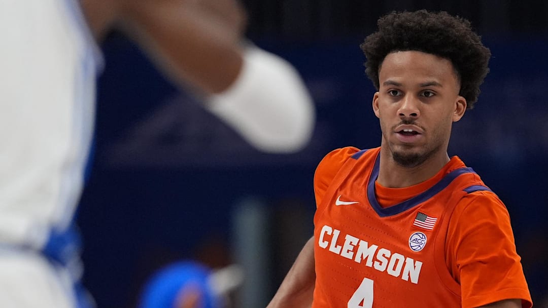 Mar 13, 2026; Charlotte, NC, USA; Clemson Tigers guard Efrem Johnson (4) handles the ball during the second half against the Duke Blue Devils at Spectrum Center. Mandatory Credit: Jim Dedmon-Imagn Images Mar 13, 2026; Charlotte, NC, USA; Clemson Tigers guard Efrem Johnson (4) handles the ball during the second half against the Duke Blue Devils at Spectrum Center. Mandatory Credit: Jim Dedmon-Imagn Images