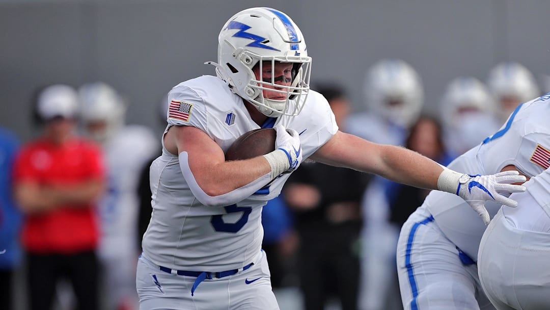 Nov 2, 2024; West Point, New York, USA; Air Force Falcons running back Dylan Carson (5) runs the ball against the Army Black Knights during the first half at Michie Stadium. Nov 2, 2024; West Point, New York, USA; Air Force Falcons running back Dylan Carson (5) runs the ball against the Army Black Knights during the first half at Michie Stadium.