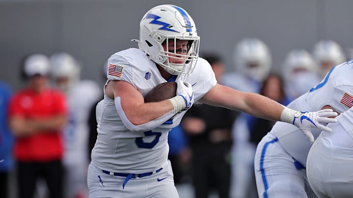 Nov 2, 2024; West Point, New York, USA; Air Force Falcons running back Dylan Carson (5) runs the ball against the Army Black Knights during the first half at Michie Stadium. Nov 2, 2024; West Point, New York, USA; Air Force Falcons running back Dylan Carson (5) runs the ball against the Army Black Knights during the first half at Michie Stadium.