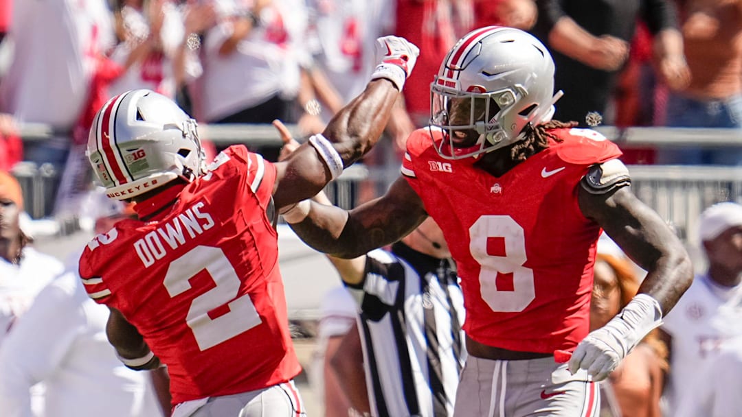 Ohio State Buckeyes safety Caleb Downs (2) and linebacker Arvell Reese (8) celebrate during the second half of the NCAA football game against the Texas Longhorns at Ohio Stadium on Aug. 30, 2025. Ohio State won 14-7.