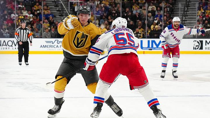 Jan 11, 2025; Las Vegas, Nevada, USA; Vegas Golden Knights left wing Pavel Dorofeyev (16) looks to skate around New York Rangers defenseman Ryan Lindgren (55) during the second period at T-Mobile Arena. Mandatory Credit: Stephen R. Sylvanie-Imagn Images Jan 11, 2025; Las Vegas, Nevada, USA; Vegas Golden Knights left wing Pavel Dorofeyev (16) looks to skate around New York Rangers defenseman Ryan Lindgren (55) during the second period at T-Mobile Arena. Mandatory Credit: Stephen R. Sylvanie-Imagn Images