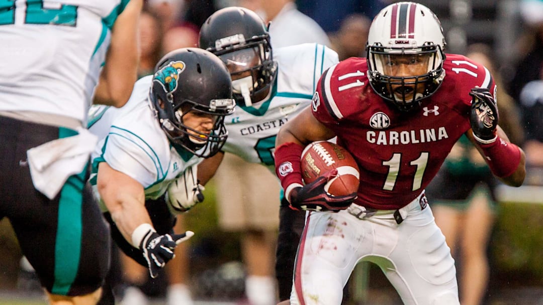 Nov 23, 2013; Columbia, SC, USA; South Carolina Gamecocks wide receiver Pharoh Cooper (11) makes a reception against the Coastal Carolina Chanticleers in the second half at Williams-Brice Stadium. Mandatory Credit: Jeff Blake-USA TODAY