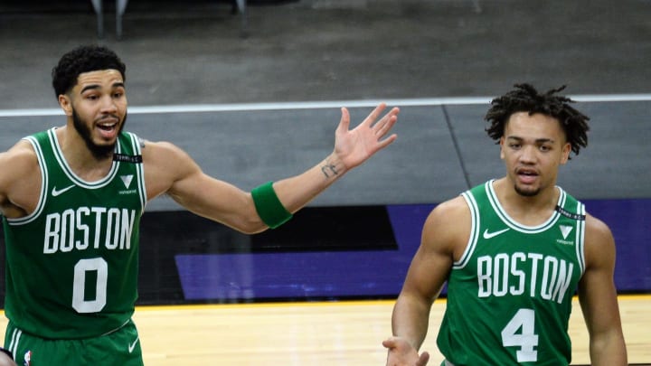 Feb 7, 2021; Phoenix, Arizona, USA; Boston Celtics forward Jayson Tatum (0) and Boston Celtics guard Carsen Edwards (4) react after a foul call during the second half as Phoenix Suns guard Chris Paul (3) looks on at Phoenix Suns Arena. Mandatory Credit: Joe Camporeale-USA TODAY Sports Feb 7, 2021; Phoenix, Arizona, USA; Boston Celtics forward Jayson Tatum (0) and Boston Celtics guard Carsen Edwards (4) react after a foul call during the second half as Phoenix Suns guard Chris Paul (3) looks on at Phoenix Suns Arena. Mandatory Credit: Joe Camporeale-USA TODAY Sports