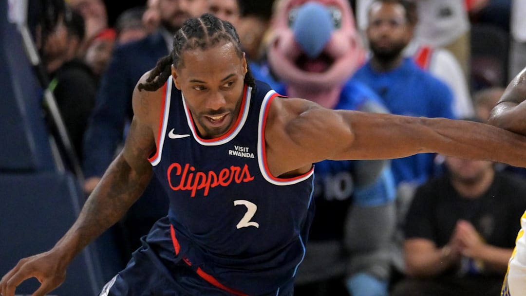 Apr 15, 2026; Inglewood, California, USA; Golden State Warriors forward Draymond Green (23) steals the ball from Los Angeles Clippers forward Kawhi Leonard (2) in the final minutes of the game of the play-in rounds of the 2026 NBA Playoffs at Intuit Dome. Mandatory Credit: Jayne Kamin-Oncea-Imagn Images Apr 15, 2026; Inglewood, California, USA; Golden State Warriors forward Draymond Green (23) steals the ball from Los Angeles Clippers forward Kawhi Leonard (2) in the final minutes of the game of the play-in rounds of the 2026 NBA Playoffs at Intuit Dome. Mandatory Credit: Jayne Kamin-Oncea-Imagn Images