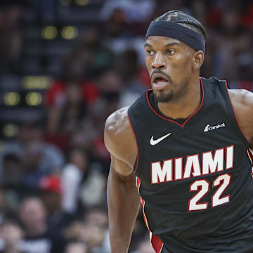 Apr 5, 2024; Houston, Texas, USA; Miami Heat forward Jimmy Butler (22) dribbles the ball during the third quarter against the Houston Rockets at Toyota Center. Mandatory Credit: Troy Taormina-Imagn Images