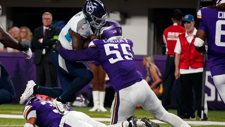 Tennessee Titans quarterback Malik Willis (7) is stopped short of the end zone by Minnesota Vikings linebacker Andre Carter II (55) during the fourth quarter at U.S. Bank Stadium in Minneapolis, Minn., Saturday, Aug. 19, 2023.