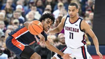 Jan 4, 2024; Spokane, Washington, USA; Pepperdine Waves guard Michael Ajayi (1) loses control of the ball against Gonzaga Bulldogs guard Nolan Hickman (11) in the second half at Spokane Arena. Gonzaga won 86-60. Mandatory Credit: James Snook-USA TODAY Sports
