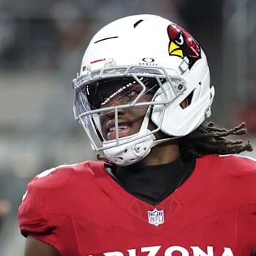 Nov 3, 2025; Arlington, Texas, USA; Arizona Cardinals wide receiver Marvin Harrison Jr. (18) scores a touchdown against the Dallas Cowboys in the first half at AT&T Stadium. Mandatory Credit: Kevin Jairaj-Imagn Images