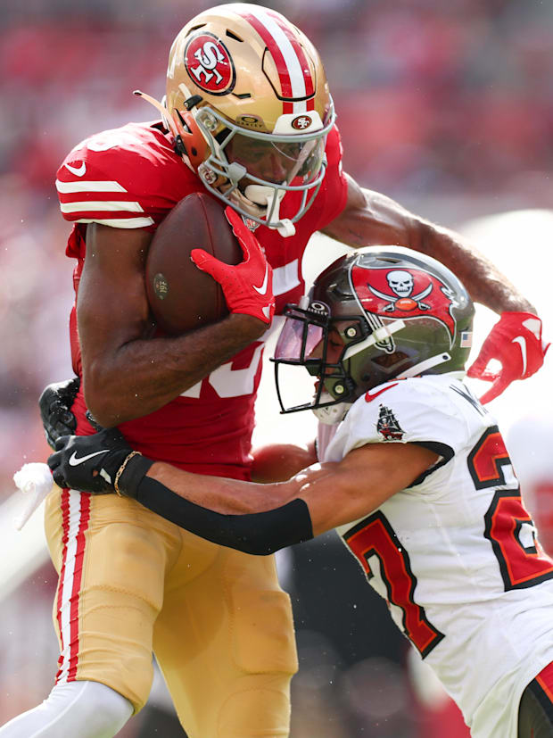 San Francisco 49ers wide receiver Jauan Jennings (15) and Tampa Bay Buccaneers cornerback Zyon McCollum (27) 