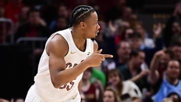 Mar 30, 2025; Cleveland, Ohio, USA; Cleveland Cavaliers forward Isaac Okoro (35) celebrates after hitting a three point basket