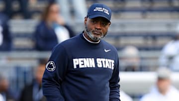 Penn State Nittany Lions interim head coach Terry Smith enters Kinnick Stadium before the game against the Iowa Hawkeyes.