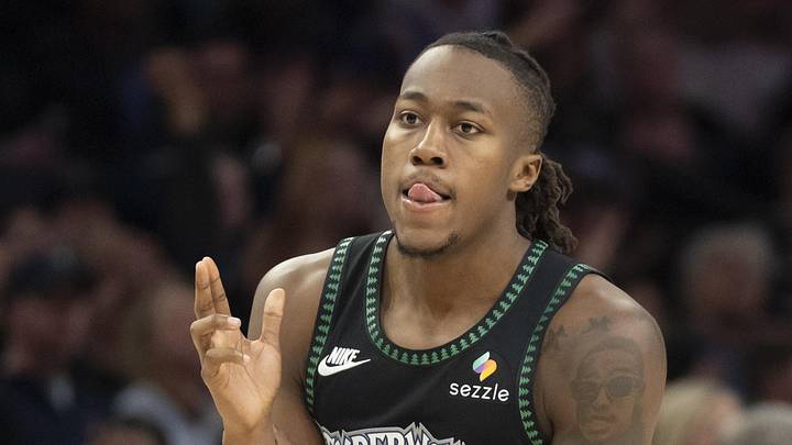 Mar 5, 2026; Minneapolis, Minnesota, USA; Minnesota Timberwolves guard Ayo Dosunmu (13) celebrates making a shot against the Toronto Raptors in the second half at Target Center. Mandatory Credit: Jesse Johnson-Imagn Images