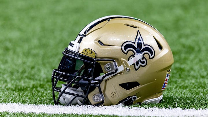 Jan 7, 2024; New Orleans, Louisiana, USA; Detailed view of the New Orleans Saints helmet during warmups against the Atlanta Falcons at Caesars Superdome. Mandatory Credit: Stephen Lew-Imagn Images Jan 7, 2024; New Orleans, Louisiana, USA; Detailed view of the New Orleans Saints helmet during warmups against the Atlanta Falcons at Caesars Superdome. Mandatory Credit: Stephen Lew-Imagn Images