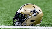 Jan 7, 2024; New Orleans, Louisiana, USA; Detailed view of the New Orleans Saints helmet during warmups against the Atlanta Falcons at Caesars Superdome. Mandatory Credit: Stephen Lew-Imagn Images