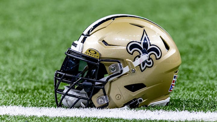 Jan 7, 2024; New Orleans, Louisiana, USA; Detailed view of the New Orleans Saints helmet during warmups against the Atlanta Falcons at Caesars Superdome. Mandatory Credit: Stephen Lew-Imagn Images