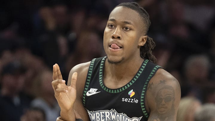 Mar 5, 2026; Minneapolis, Minnesota, USA; Minnesota Timberwolves guard Ayo Dosunmu (13) celebrates making a shot against the Toronto Raptors in the second half at Target Center. Mandatory Credit: Jesse Johnson-Imagn Images