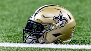 Detailed view of the New Orleans Saints' helmet during warmups against the Atlanta Falcons.