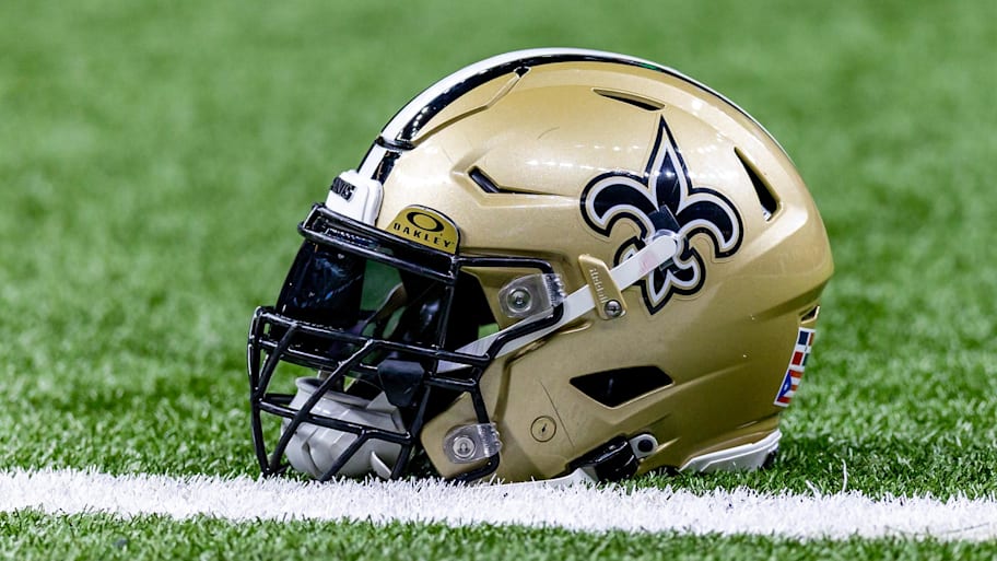 Detailed view of the New Orleans Saints helmet during warmups against the Atlanta Falcons. | Stephen Lew-Imagn Images