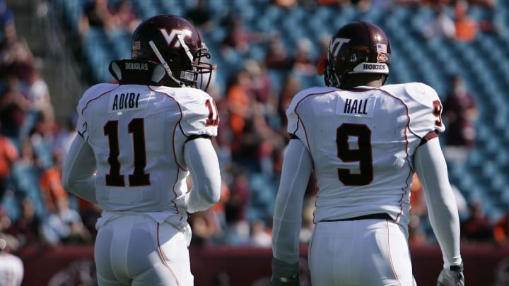 Dec 1, 2007; Jacksonville, FL, USA; Virginia Tech Hokies linebacker Xavier Adibi (11) and linebacker Vince Hall (9) before the start of the ACC Championship against the Boston College Eagles at Jacksonville Municipal Stadium.  Mandatory Credit: James Lang-USA TODAY Sports