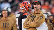 Cincinnati Bengals head coach Zac Taylor watches a replay on the video board as quarterback Joe Burrow (9) returns to the bench after throwing an interception in the fourth quarter of the NFL Week 10 game between the Cincinnati Bengals and the Houston Texans at Paycor Stadium in downtown Cincinnati on Sunday, Nov. 12, 2023.