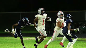 Seminole Ridge's Ty Jackson during a run in the first half against Spanish River on Aug. 30, 2024.