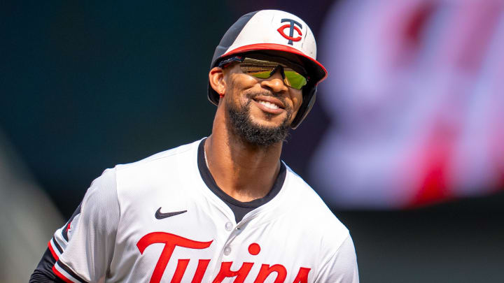 Jul 21, 2024; Minneapolis, Minnesota, USA; Minnesota Twins center field Byron Buxton (25) hits a home run in the eighth ninth inning against Milwaukee Brewers at Target Field. Mandatory Credit: Matt Blewett-USA TODAY Sports