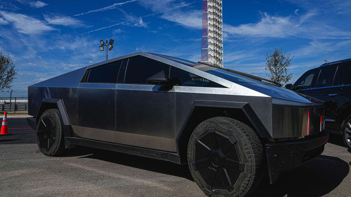 A Tesla Cybertruck is parked outside the 44 Club during the Formula 1 Lenovo United States Grand Prix at Circuit of Americas.