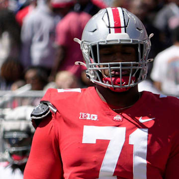 April 13, 2024; Columbus, Ohio, USA; 
Ohio State Buckeyes offensive tackle Josh Simmons (71) competes during the first half of the LifeSports spring football game at Ohio Stadium on Saturday.