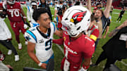 Arizona Cardinals quarterback Kyler Murray (1) greets Carolina Panthers quarterback Bryce Young (9) after Arizona's 27-22 win at State Farm Stadium on Sept 14, 2025.
