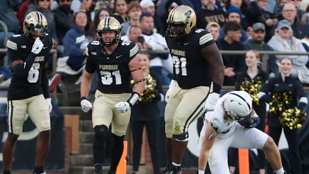 Purdue Boilermakers defensive back Dillon Thieneman celebrates after tackling Penn State Nittany Lions tight end Tyler Warren