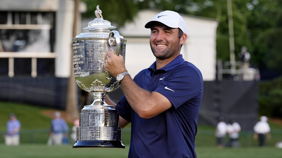 Scottie Scheffler holds the Wanamaker Trophy after winning the PGA Championship golf tournament at Quail Hollow. | Jim Dedmon-Imagn Images