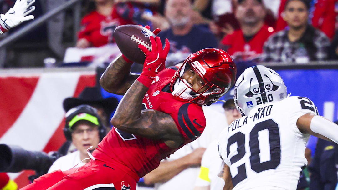 Dec 21, 2025; Houston, Texas, USA; Houston Texans wide receiver Nico Collins (12) catches a pass against the Las Vegas Raiders during the fourth quarter at NRG Stadium. Mandatory Credit: Troy Taormina-Imagn Images