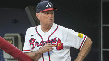 Atlanta Braves manager Brian Snitker (43) is shown in the dugout against the New York Mets during the first inning at Truist Park.