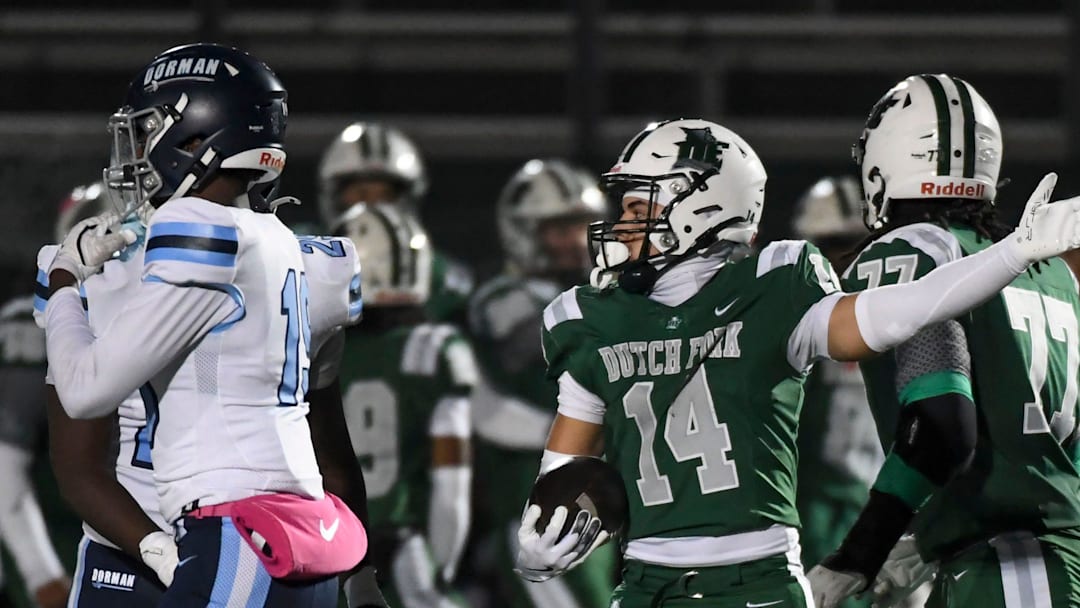 Dutch Fork Silver Foxes Stone Furrey (14) celebrates after a first down Friday, Nov. 28, 2025, during the SCHSL semi state football game against the Dorman Cavaliers at Dutch Fork High School in Irmo, South Carolina.