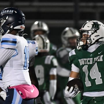Dutch Fork Silver Foxes Stone Furrey (14) celebrates after a first down Friday, Nov. 28, 2025, during the SCHSL semi state football game against the Dorman Cavaliers at Dutch Fork High School in Irmo, South Carolina.