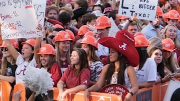College GameDay was on campus at the University of Alabama for the matchup between the Alabama Crimson Tide and the Texas Longhorns Saturday, Sept. 9, 2023. Fans hold signs in the background of the GameDay set demonstrating their feelings about the game.