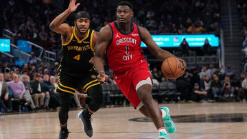 Jan 10, 2024; San Francisco, California, USA; New Orleans Pelicans forward Zion Williamson (1) dribbles past Golden State Warriors guard Moses Moody (4) in the third quarter at the Chase Center.