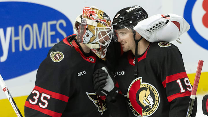 Dec 11, 2024; Ottawa, Ontario, CAN; Ottawa Senators goalie Linus Ullmark (35) and right wing Drake Batherson (19) celebrate their win against the Anaheim Ducks at the Canadian Tire Centre. Mandatory Credit: Marc DesRosiers-Imagn Images