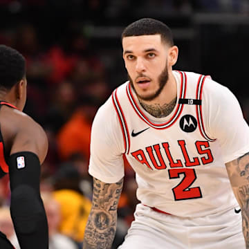 Feb 28, 2025; Chicago, Illinois, USA; Chicago Bulls guard Lonzo Ball (2) controls the ball during a game against the Toronto Raptors at the United Center. Mandatory Credit: Patrick Gorski-Imagn Images