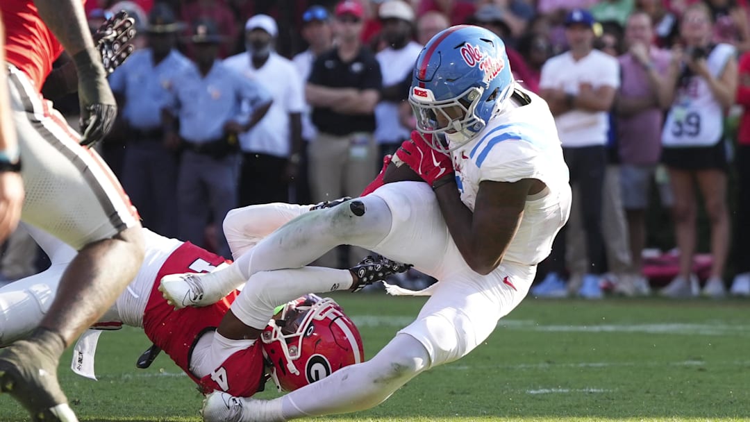 Oct 18, 2025; Athens, Georgia, USA; Mississippi Rebels running back Kewan Lacy (5) scores a touchdown against Georgia Bulldogs defensive back Kj Bolden (4) during the second quarter of the game at Sanford Stadium. Mandatory Credit: Dale Zanine-Imagn Images Oct 18, 2025; Athens, Georgia, USA; Mississippi Rebels running back Kewan Lacy (5) scores a touchdown against Georgia Bulldogs defensive back Kj Bolden (4) during the second quarter of the game at Sanford Stadium. Mandatory Credit: Dale Zanine-Imagn Images