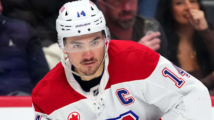 Nov 29, 2025; Denver, Colorado, USA; Montreal Canadiens center Nick Suzuki (14) during the third period against the Colorado Avalanche at Ball Arena. Mandatory Credit: Ron Chenoy-Imagn Images