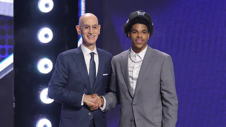 NBA commissioner Adam Silver greets the eighteenth pick in the 2026 NBA draft, Texas Tech guard Christian Anderson Jr.