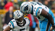 Carolina Panthers running back Rico Dowdle (5) and offensive tackle Yosh Nijman (77) celebrate after Dowdle runs for a first down to set up a game-winning field goal against the Green Bay Packers on Sunday, November 2, 2025, at Lambeau Field in Green Bay, Wis. The Panthers won the game, 16-13, on a 49-yard field goal as time expired.
Tork Mason/USA TODAY NETWORK-Wisconsin