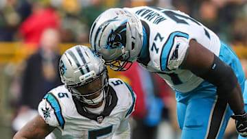 Carolina Panthers running back Rico Dowdle (5) and offensive tackle Yosh Nijman (77) celebrate after Dowdle runs for a first down to set up a game-winning field goal against the Green Bay Packers on Sunday, November 2, 2025, at Lambeau Field in Green Bay, Wis. The Panthers won the game, 16-13, on a 49-yard field goal as time expired.
Tork Mason/USA TODAY NETWORK-Wisconsin