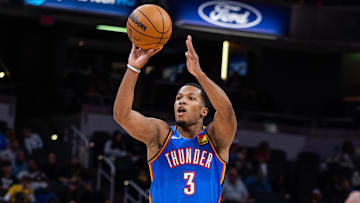 Oct 11, 2025; Indianapolis, Indiana, USA; Oklahoma City Thunder guard Chris Youngblood (3) shoots the ball in the second half against the Indiana Pacers at Gainbridge Fieldhouse. Mandatory Credit: Trevor Ruszkowski-Imagn Images