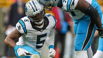 Carolina Panthers running back Rico Dowdle (5) and offensive tackle Yosh Nijman (77) celebrate after Dowdle runs for a first down to set up a game-winning field goal against the Green Bay Packers on Sunday, November 2, 2025, at Lambeau Field in Green Bay, Wis. The Panthers won the game, 16-13, on a 49-yard field goal as time expired.
Tork Mason/USA TODAY NETWORK-Wisconsin