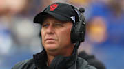 Oct 25, 2025; Pittsburgh, Pennsylvania, USA;  North Carolina State Wolfpack head coach Dave Doeren looks on from the sidelines against the Pittsburgh Panthers during the first quarter at Acrisure Stadium. Mandatory Credit: Charles LeClaire-Imagn Images