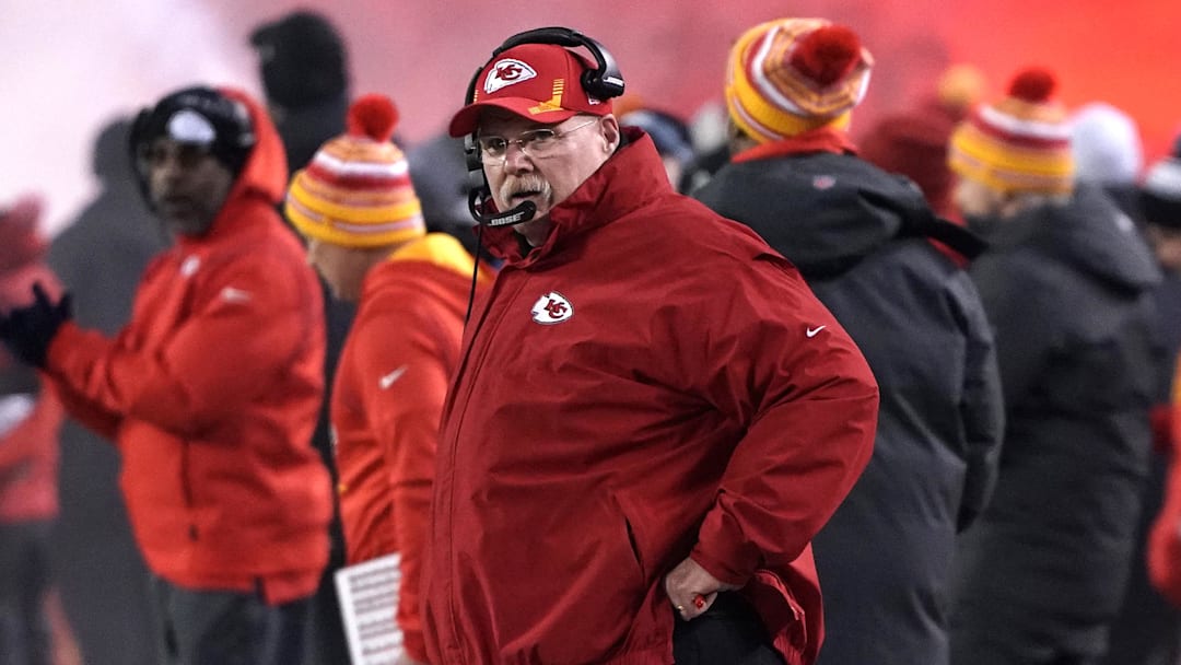 Jan 16, 2022; Kansas City, Missouri, USA; Kansas City Chiefs head coach Andy Reid (front) looks on from the sideline during the first quarter against the Pittsburgh Steelers in an AFC Wild Card playoff football game at GEHA Field at Arrowhead Stadium. Mandatory Credit: Denny Medley-Imagn Images